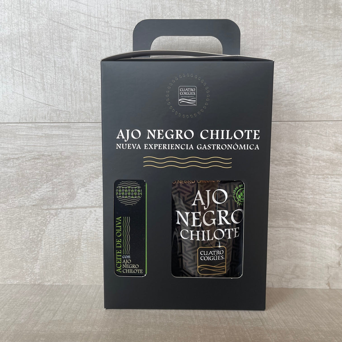 Caja de regalo para toda ocasión: Aceite de oliva emulsionado con extracto de ajo negro + Doypack de dientes pelados de ajo negro 80gr.